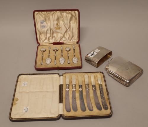 A silver spirit flask, of curved rectangular form, with a pull-off beaker, the (hinged cap missing), London 1929, gross weight 267 gms, a set of six N