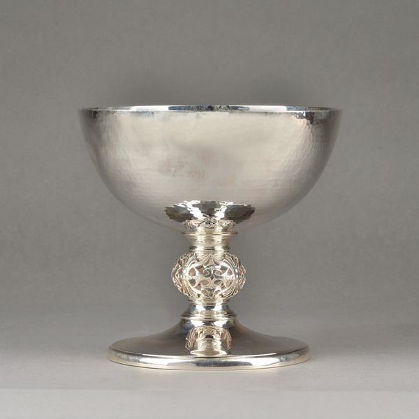 A silver table centrepiece bowl, of circular form, with a pierced bulbous stem above a  circular foot, height 17.5cm, diameter 19cm, modern, weight 94