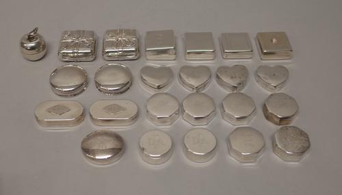 A collection of twenty-four foreign pill and trinket boxes, comprising; five octagonal matching examples, four heart shaped examples, a pair of square