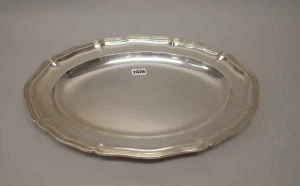 A Danish serving dish, of shaped oval form, with a stepped rim, detailed Michelsen 1985 925, length 45cm, weight 1361 gms.