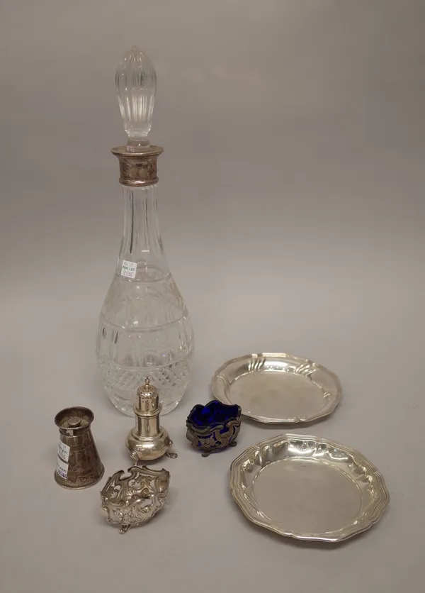 Silver and silver mounted wares, comprising; a faceted glass decanter, Birmingham 1982, a Victorian pepper mill formed as a milk churn, London 1885, a