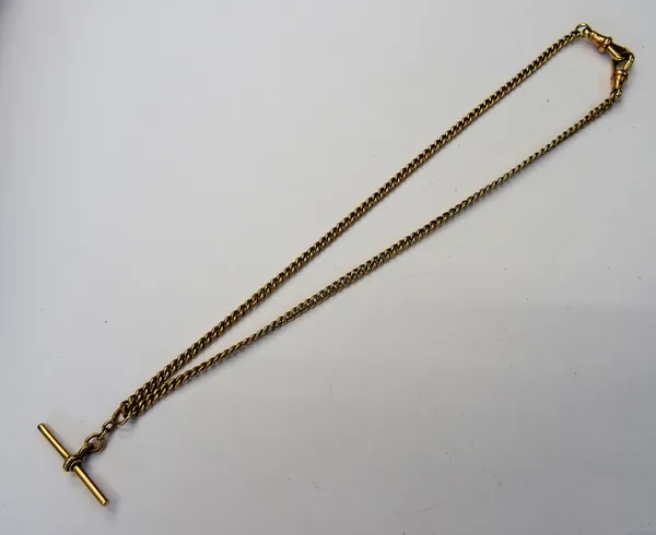 A 9ct gold curb link watch Albert chain, fitted with a 9ct gold T bar and with two 9ct gold swivels, weight 12.4 gms
