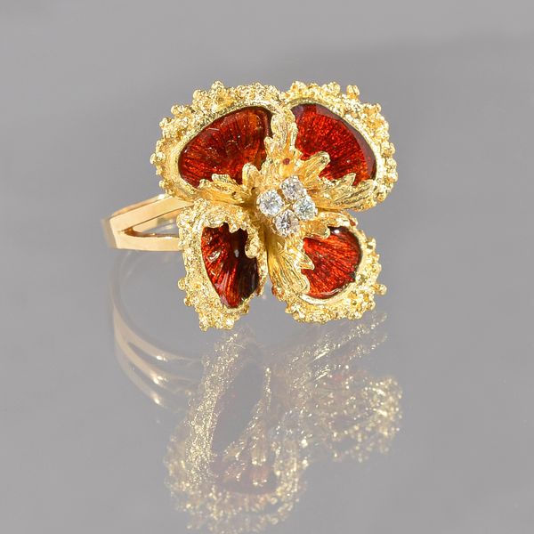 A gold, red enamelled and diamond set ring, designed as a flowerhead, claw set with four circular cut diamonds to the centre, ring size P, gross weigh