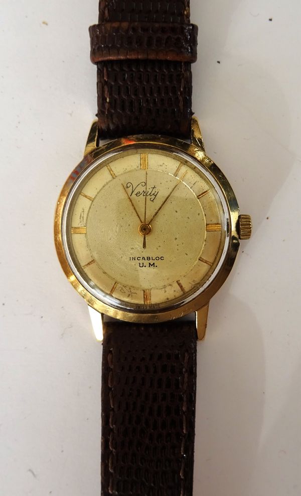 A Verity 9ct gold, circular cased gentleman's wristwatch, the signed circular dial with gilt baton numerals, gilt hands and with centre seconds, on a