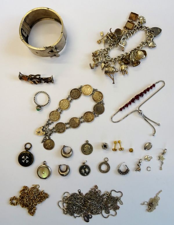 A group of silver and other jewellery, comprising; a curb link charm bracelet, fitted with a variety of mostly silver charms and with a heart shaped p