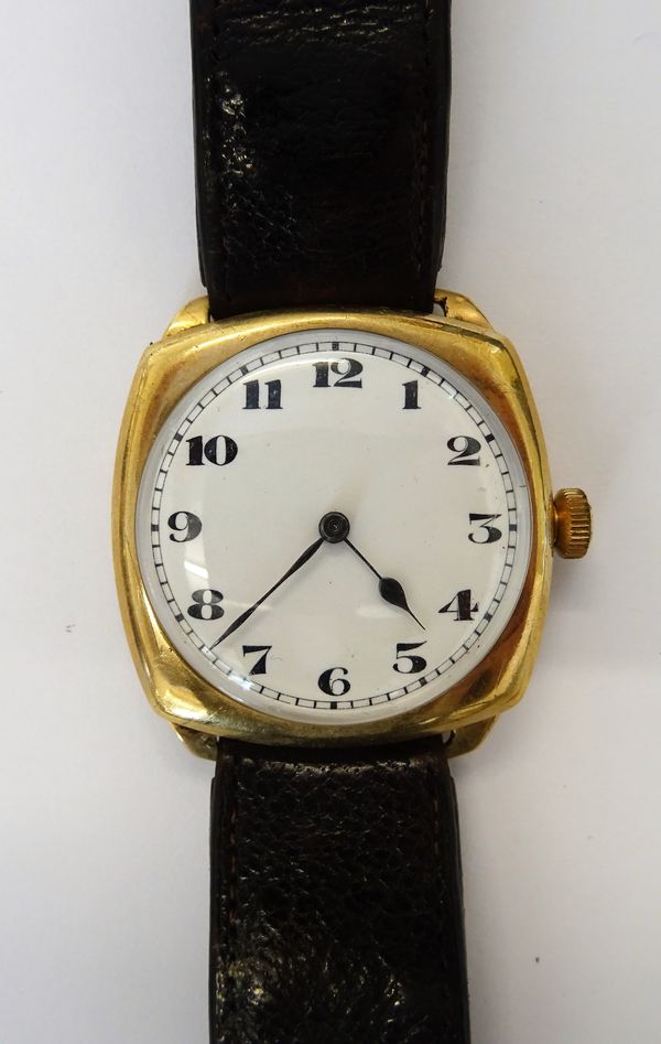 An A.W.W. Co. Lady Waltham 9ct gold curved square cased wristwatch, the signed jewelled movement numbered 18005856, the enamelled dial with black Arab