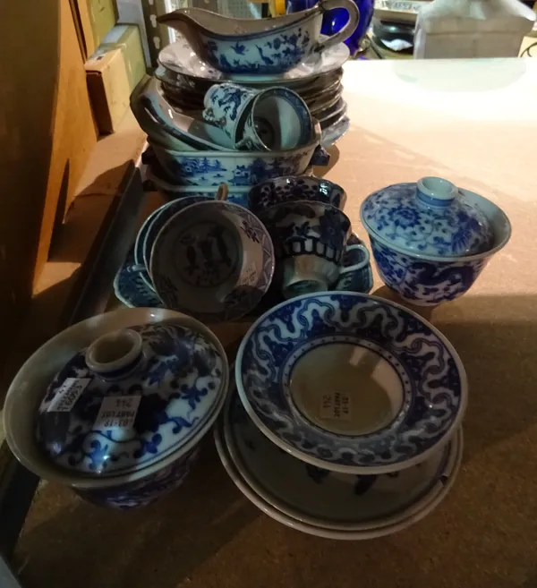 Chinese blue and white export porcelain, 18th century and later, including; nine variously decorated plates; a sauceboat; a pair of small sauce tureen