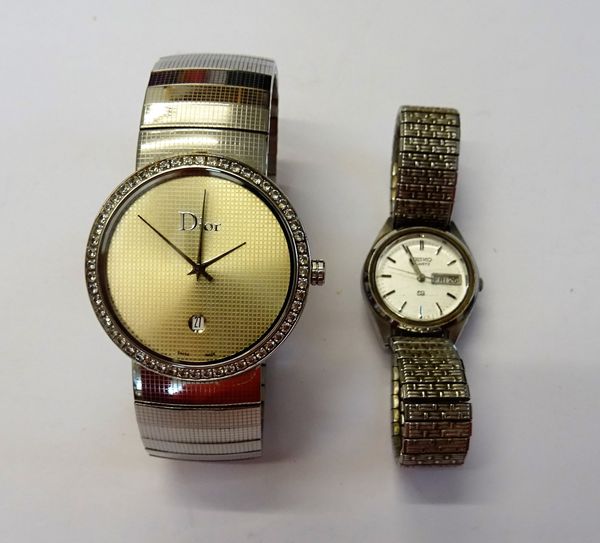 A Christian Dior steel and colourless paste set dress wristwatch, the signed textured dial with a date of the month aperture and with plain hands, the