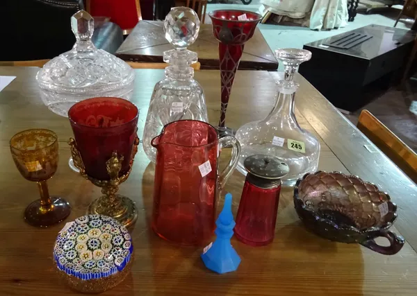 English and Continental glassware, 19th/20th century, to include; a Bohemian engraved ruby glass and gilt-metal mounted goblet; two decanters and stop