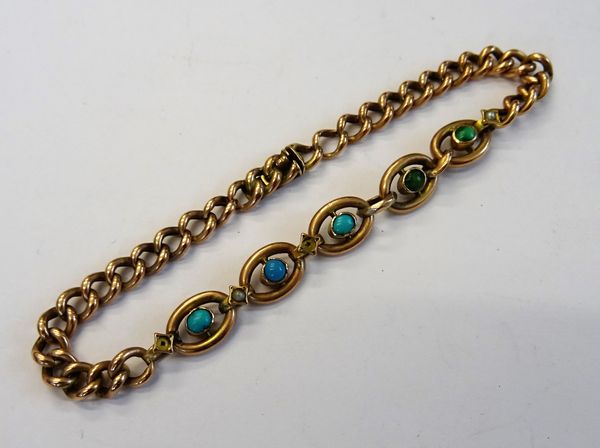 A gold, turquoise and seed pearl bracelet, of curb link form, the oval front links mounted with a row of five turquoise, the seed pearl divisions most