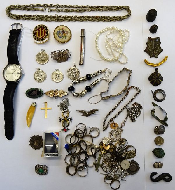 A group of silver and other jewellery, including; a quantity of rings, various pendants and charms, three bracelets, brooches, a watch Albert chain, w