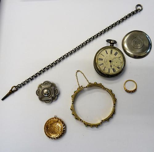 A turquoise set gilt bracelet, in a curved panel shaped link design, on a snap clasp, detailed Silver, a gold back and front circular pendant locket,