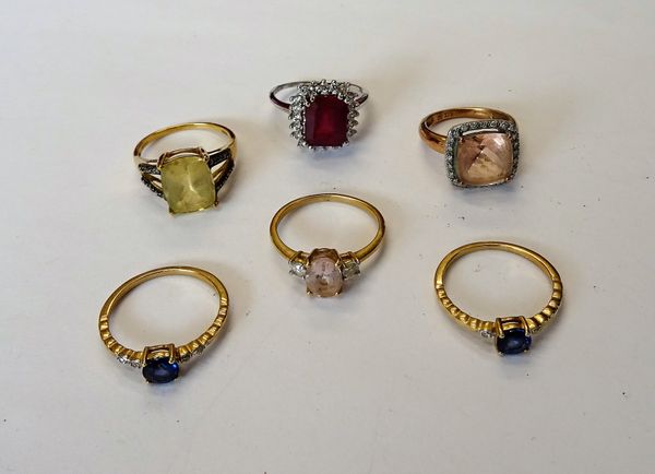 Six 9ct gold and gem set rings, in a variety of designs, combined gross weight 14.4 gms. (6)