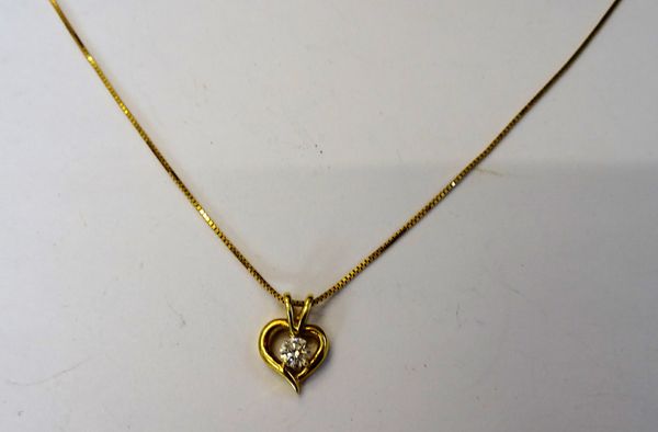 A gold and diamond set single stone pendant, in an open heart shaped design, claw set with a circular cut diamond, with a 18ct gold box link neckchain