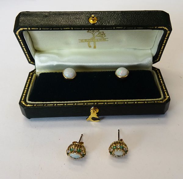 A pair of 9ct gold, opal, emerald and colourless gem set oval cluster earstuds and a pair of gold and opal single stone earstuds, the back fittings de