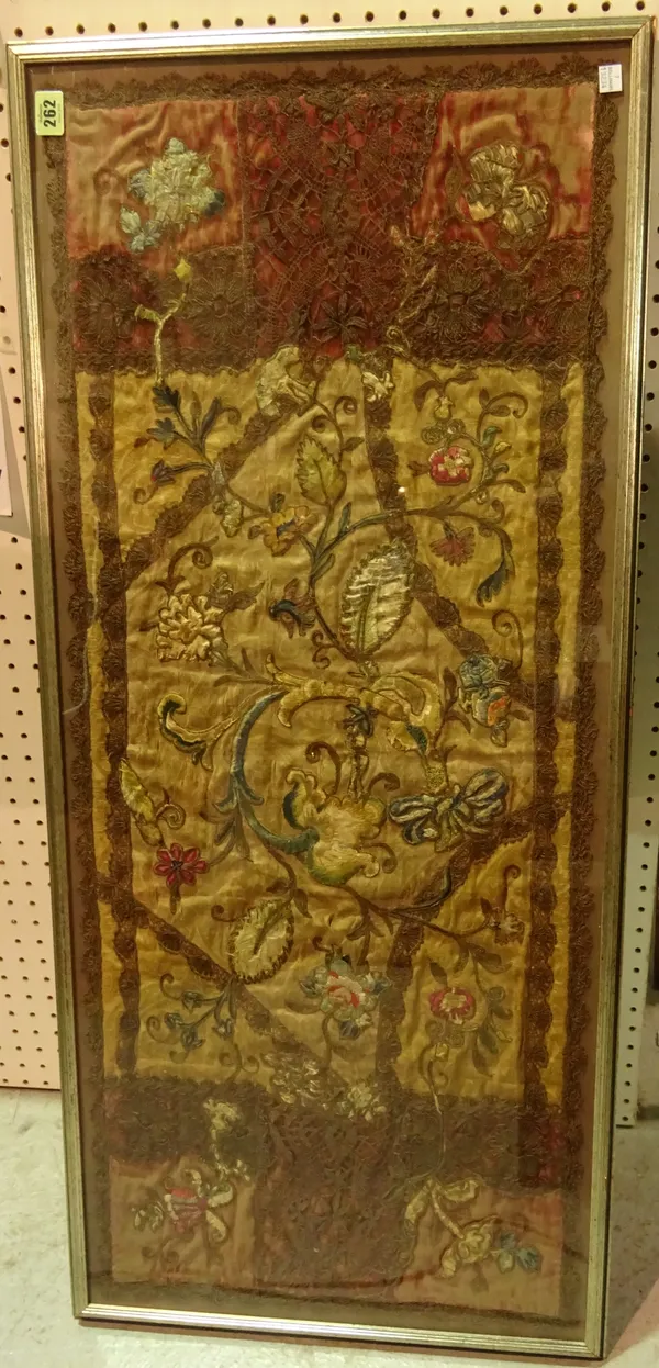 A 17th century Continental lace and needlework panel, bird and floral designs within velvet ends, approx. 43 x 104cm.