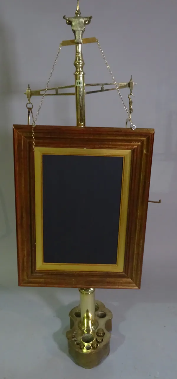 A late Victorian brass floorstanding butcher's scale with later added advertising chalk board, 164cm high.