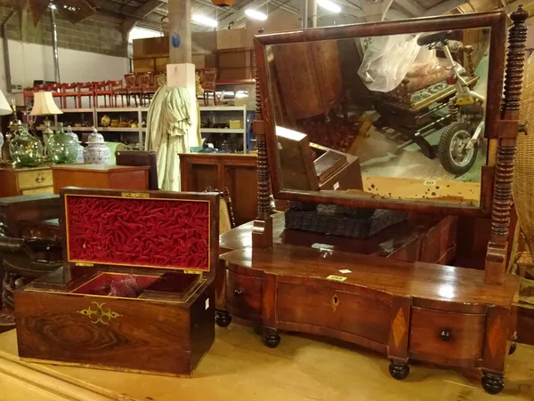 A 19th century mahogany serpentine dressing table mirror with three drawer base, 70cm wide and a 19th century rosewood tea caddy, (a.f) (2).