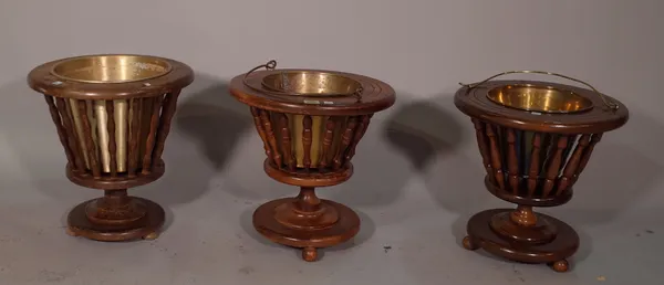 Three 20th century Dutch jardinieres, with turned slatted bodies on circular bases, each approximately 38cm diameter x 38cm high, (3).