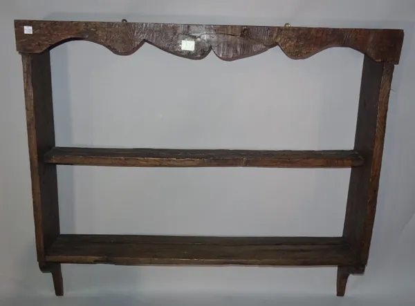 A late 18th century oak two tier hanging plate rack, 93cm wide x 83cm high.