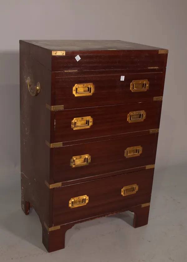 A 20th century mahogany and brass bound campaign chest with writing slope over four drawers on bracket feet, 50cm wide x 84cm high.