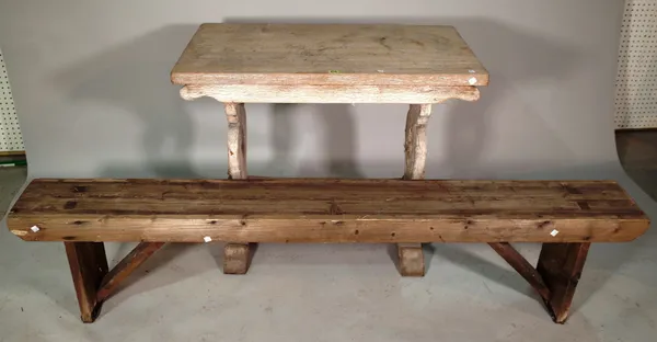 An early 20th century limed oak refectory table, 92cm wide x 76cm high and a 20th century pine bench, 183cm long x 42cm high, (2).