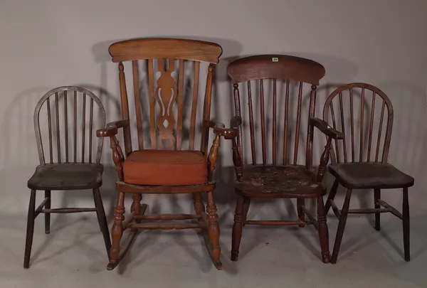 A Victorian style ash and elm rocking armchair, a late Victorian elm scullery chair and a pair of early 20th century spindle back side chairs, (4).