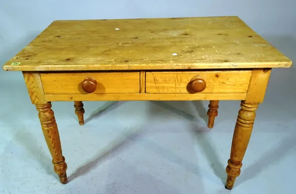 An early pine two drawer side table, 107cm wide x 73cm high.