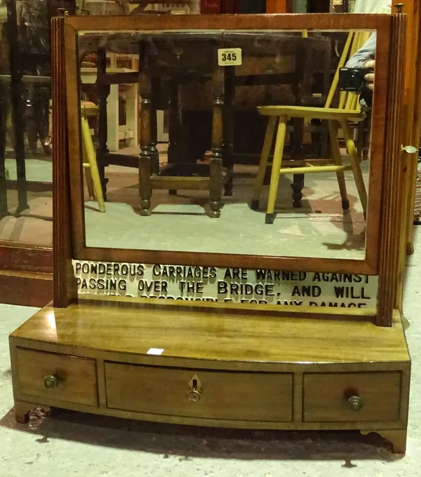 A George III mahogany toilet mirror with bowed three drawer base, 54cm wide x 55cm high.