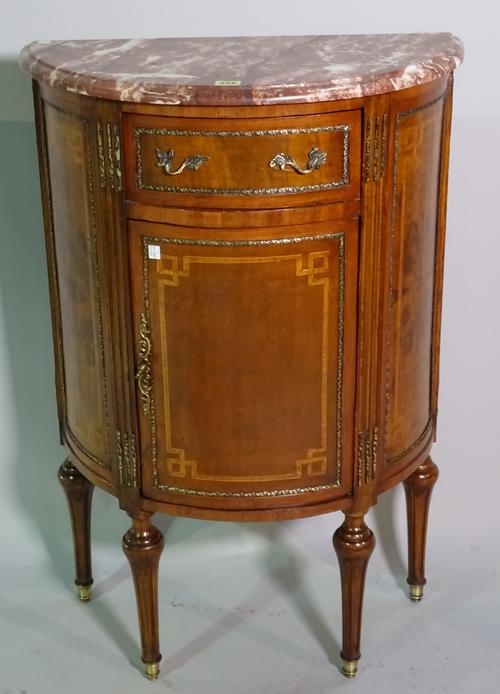 A Louis XV style walnut bowfront side cabinet with red marble top on fluted tapering supports, 62cm wide x 94cm high.