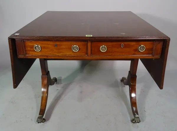 A Regency style mahogany sofa table on dual ended supports, 79cm wide x 71cm high.