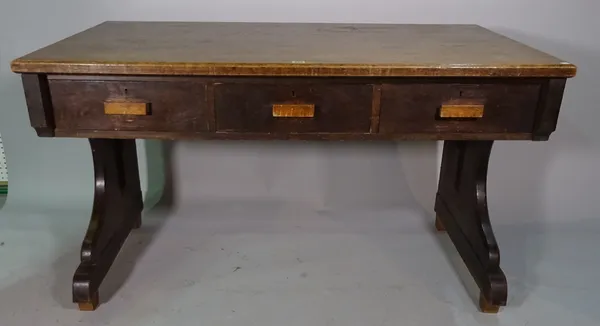 A 19th century oak Gothic Revival three drawer desk, 137cm wide x 82cm high.