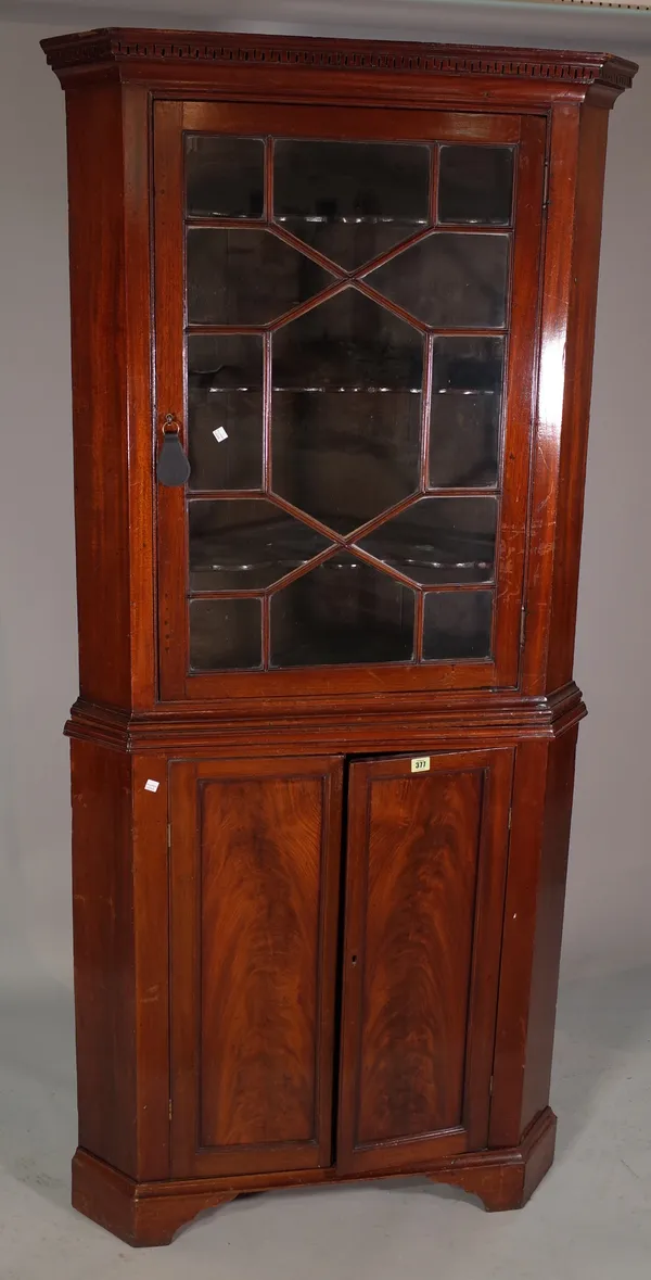 A late George III mahogany corner display cabinet with astragal glazed doors, 90cm wide x 198cm high.