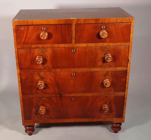 A late Victorian mahogany chest of two short and three long drawers on turned supports, 86cm wide x 104cm high.