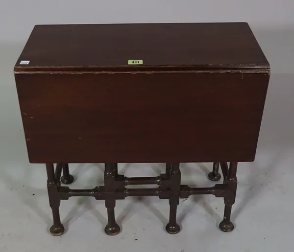 A 19th century mahogany drop flap table on spider leg supports, 55cm wide x 50cm high, and a Victorian mahogany bidet, 57cm high x 42cm high, (2).