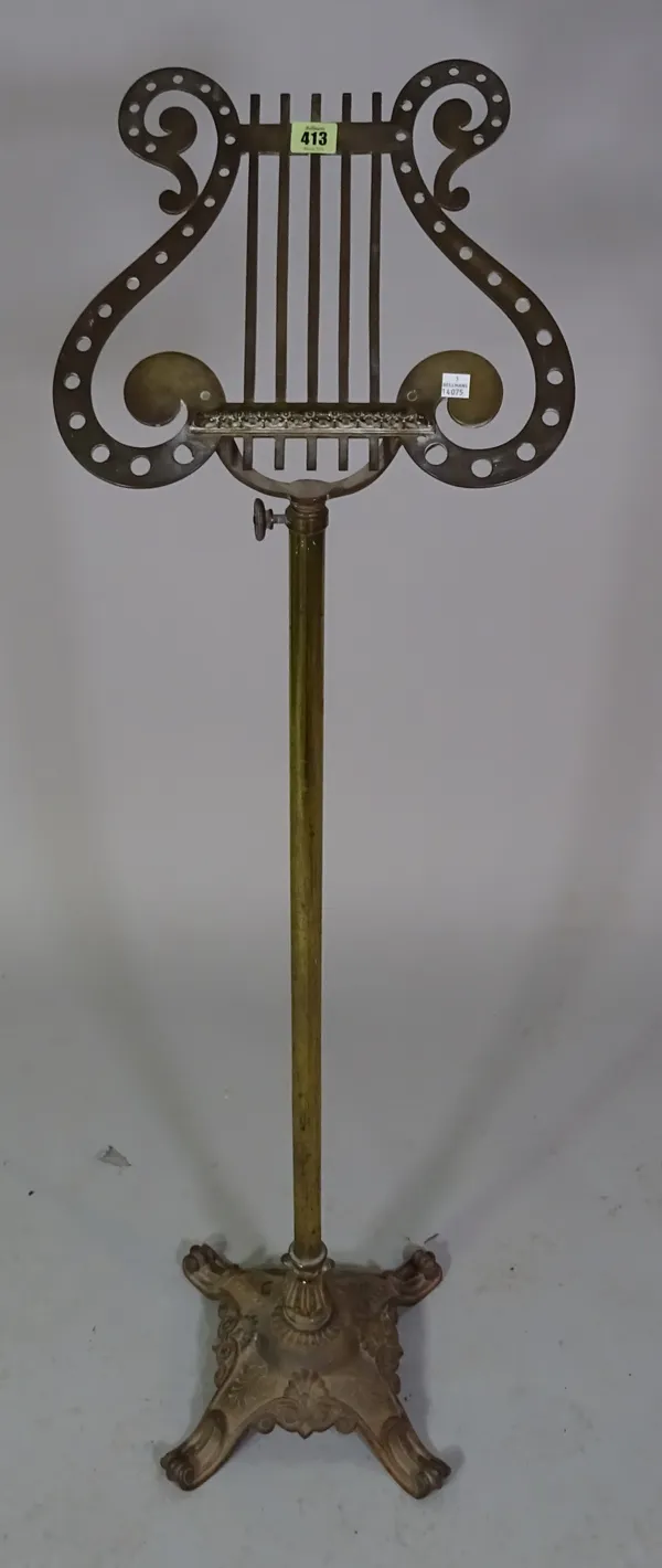 A late Victorian brass music stand, 120cm high.