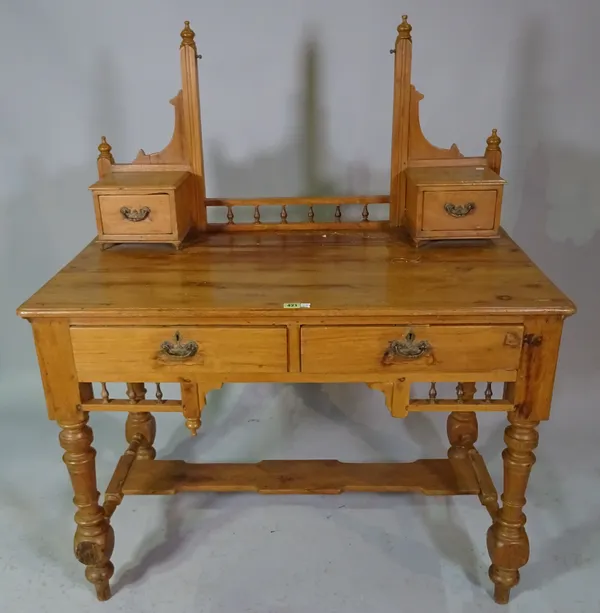 A late 19th century teak dressing table, with swing frame mirror, 105cm wide x 155cm high.