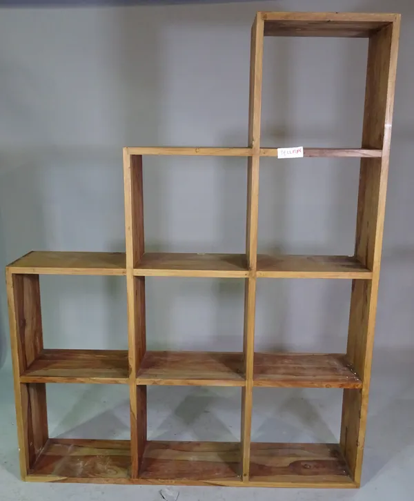 A 20th century hardwood modular open bookcase, 140cm wide x 183cm high.