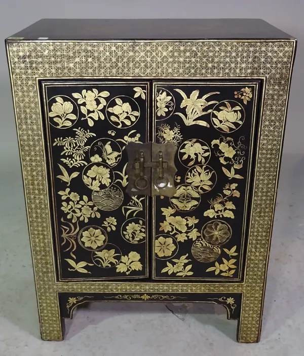 An early 20th century Chinese export chinoiserie decorated small two door side cabinet, 60cm wide x 82cm high.