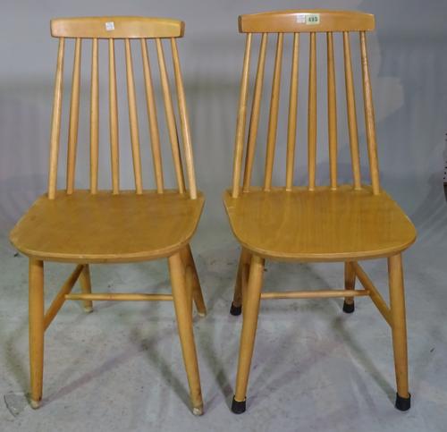 A set of four beech Ercol style stick back dining chairs, 41cm wide x 82cm high, (4).