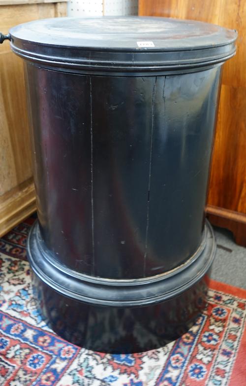 An ebonised wooden pedestal, early 20th century, with revolving circular plinth top over a waisted circular base, 81.5cm high x 56.5cm diameter.