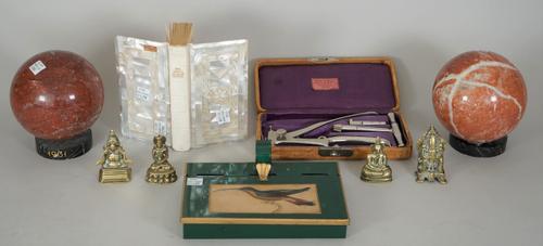 A quantity of small collectables, comprising; a cased surgical instrument by Drake & Drake, cased, a mother-of-pearl bound bible, two red marble spher