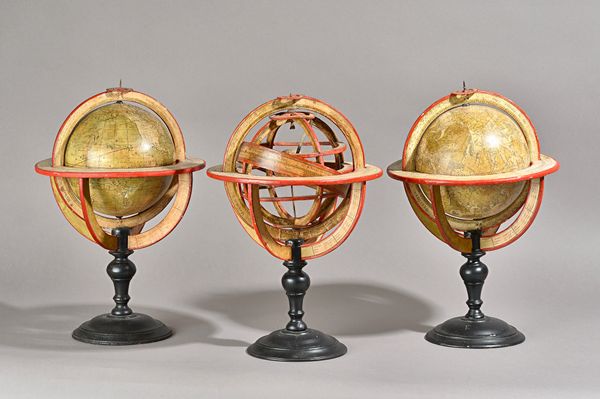 A matched pair of 7 inch celestial terrestrial globes by Charles Francois Delamarche, dated 1791 and 1770, on an ebonised turned stand and a Delamarch