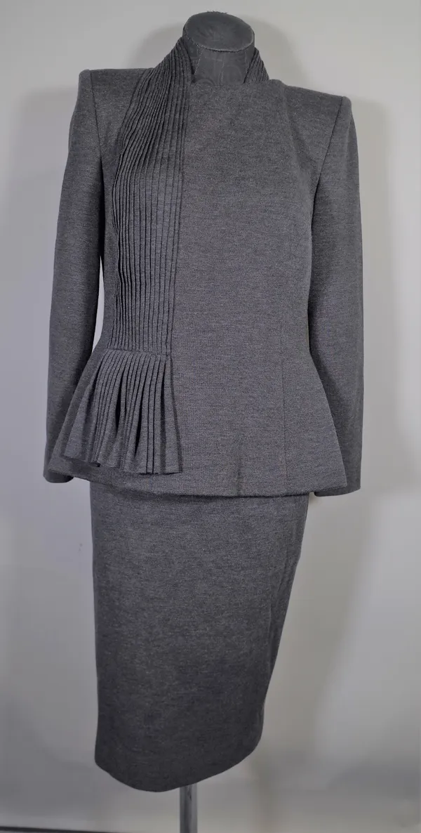 An Yves Saint Laurent day dress with velvet waistband, circa 1980, a Jean Paul Gautier grey skirt and matching fitted long sleeve top, (3).(Ex Christi