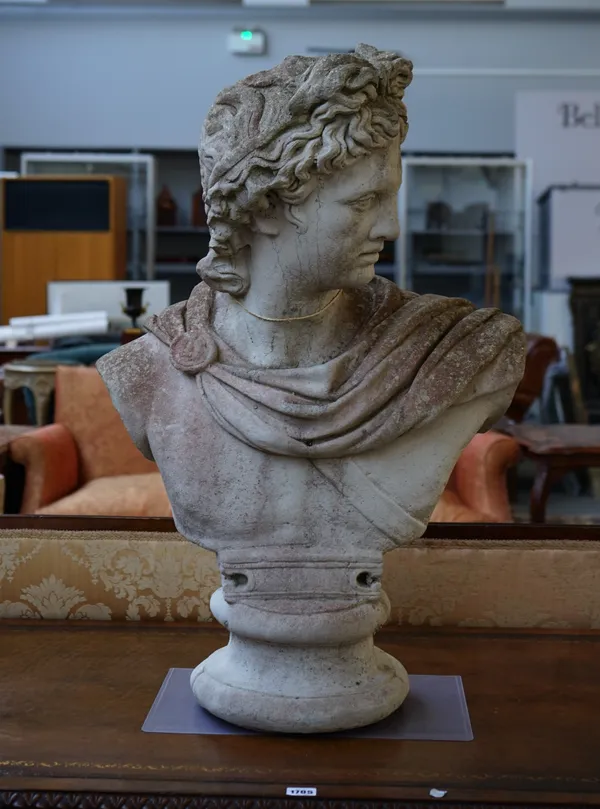 A reconstituted stone bust of Alexander The Great, on turned socle, 56cm x 83cm high.