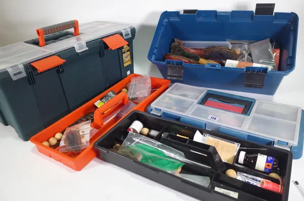 Two tackle boxes full of fly tying equipment, capes, furs, tools, and silks, (qty).