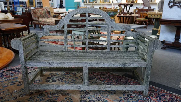 A near pair of teak Lychens benches, each approx. 199cm wide x 103cm high, (2).