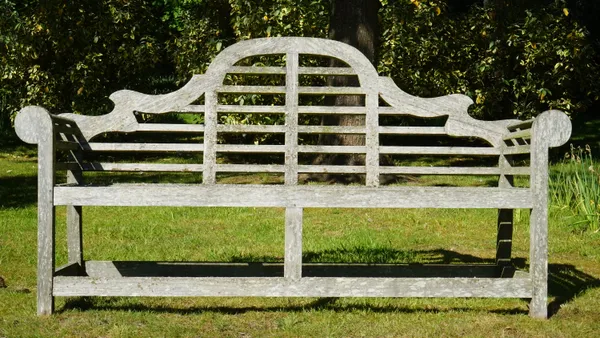 A near pair of teak Lutyens benches, each approx. 199cm wide x 103cm high, (2).