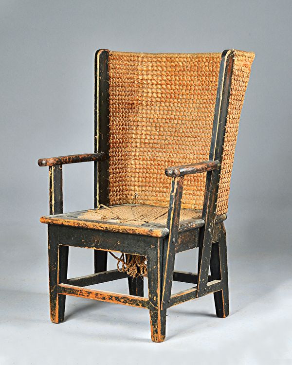 An early 20th century stained pine Orkney chair on tapering square supports, 54cm wide x 81cm high. Illustrated.