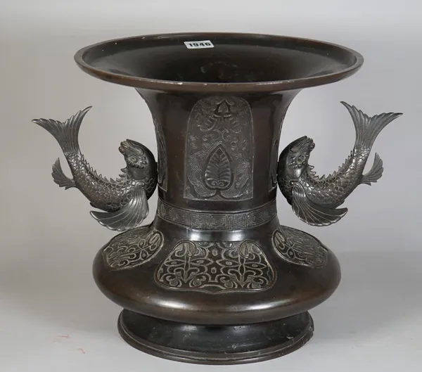 A Chinese bronze two-handled vase, 19th century, the squat body decorated with foliate panels beneath a waisted neck decorated with lappets, the separ